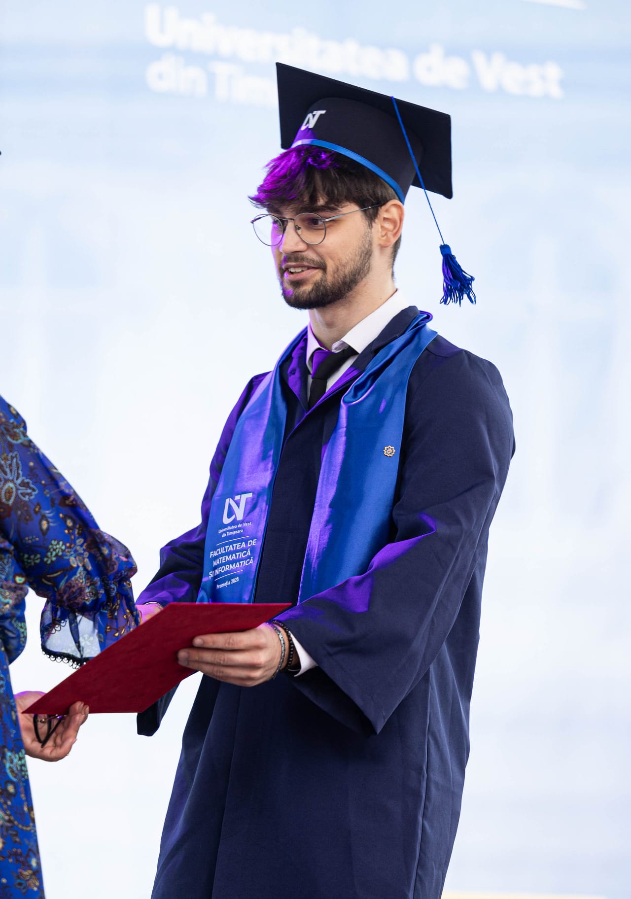 Absolvent al Facultății de Matematică și Informatică